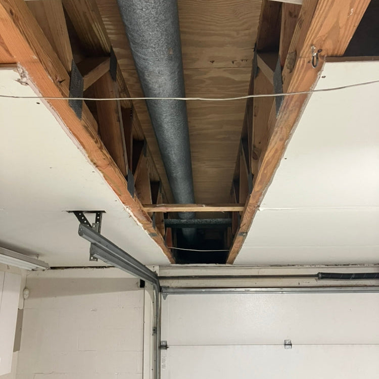 A Patriot Clean Out Services team performing interior mold-remediation demolition for a commercial property owner in Northwest Indiana. The image shows walls and materials being safely removed, representing professional commercial demolition and cleanup services for local businesses.