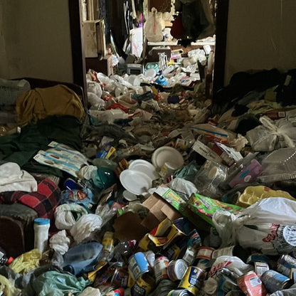 A cluttered home in Northwest Indiana before professional hoarding cleanup by Patriot Clean Out Services. The image represents compassionate, thorough removal and restoration provided by the veteran-owned cleanup team.