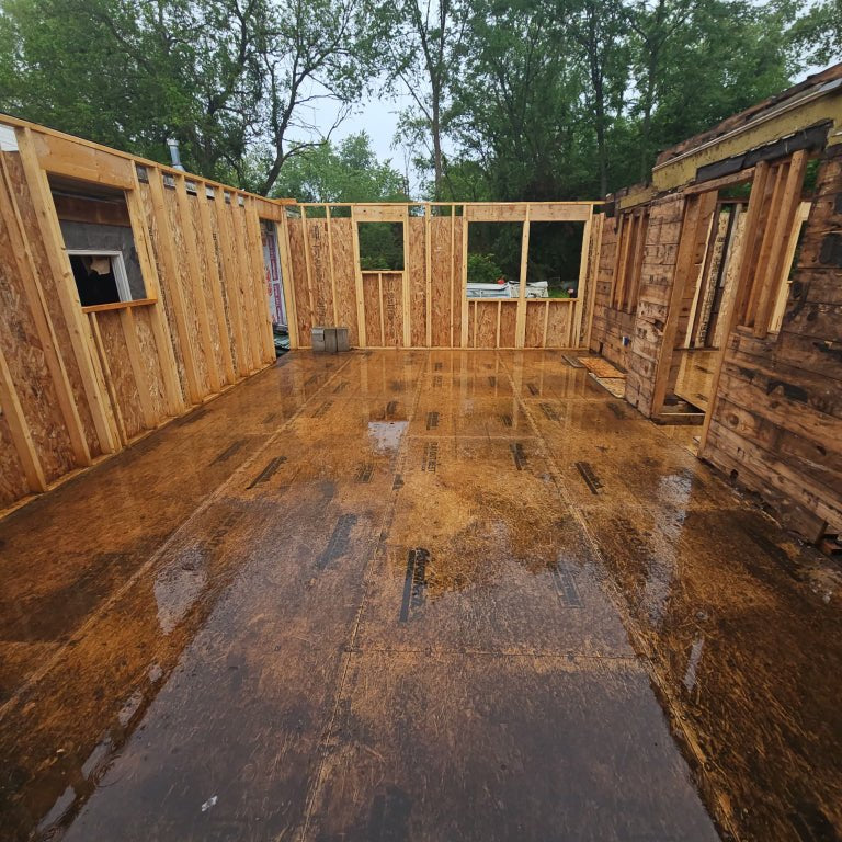 A freshly cleaned construction site in Northwest Indiana after professional debris removal by Patriot Clean Out Services. The photo highlights a safe, organized workspace ready for builders, showcasing expert post-construction cleanup and site preparation by a veteran-owned company.